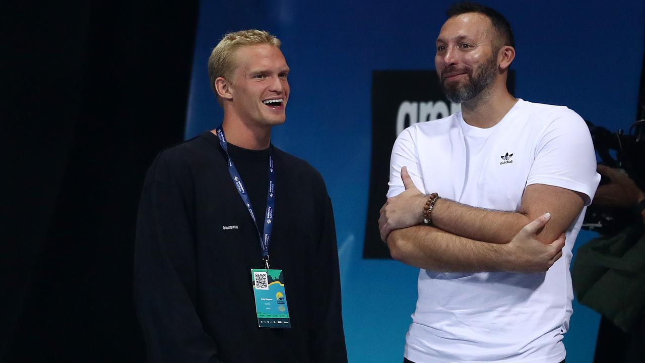 Cody Simpson and Ian Thorpe talk during the 2021 Australian Swimming Championships at the Gold Coast Aquatic Centre on April 15, 2021. Picture: Chris Hyde/Getty Images