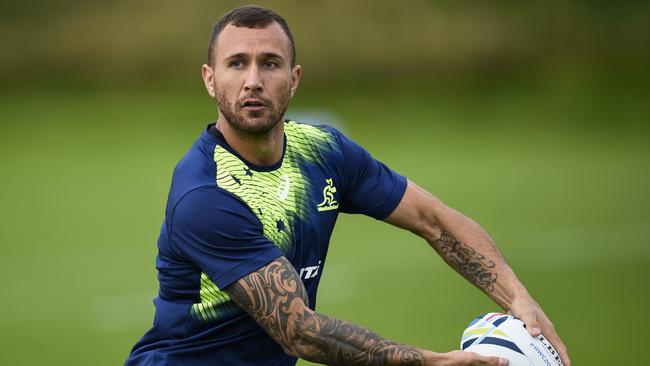 Australia's flyhalf Quade Cooper attends a training session, on September 15, 2015 at the University of Bath, three days before the opening match of the Rugby World Cup 2015 between England and Fidji at Twickenham stadium. AFP PHOTO / MARTIN BUREAU