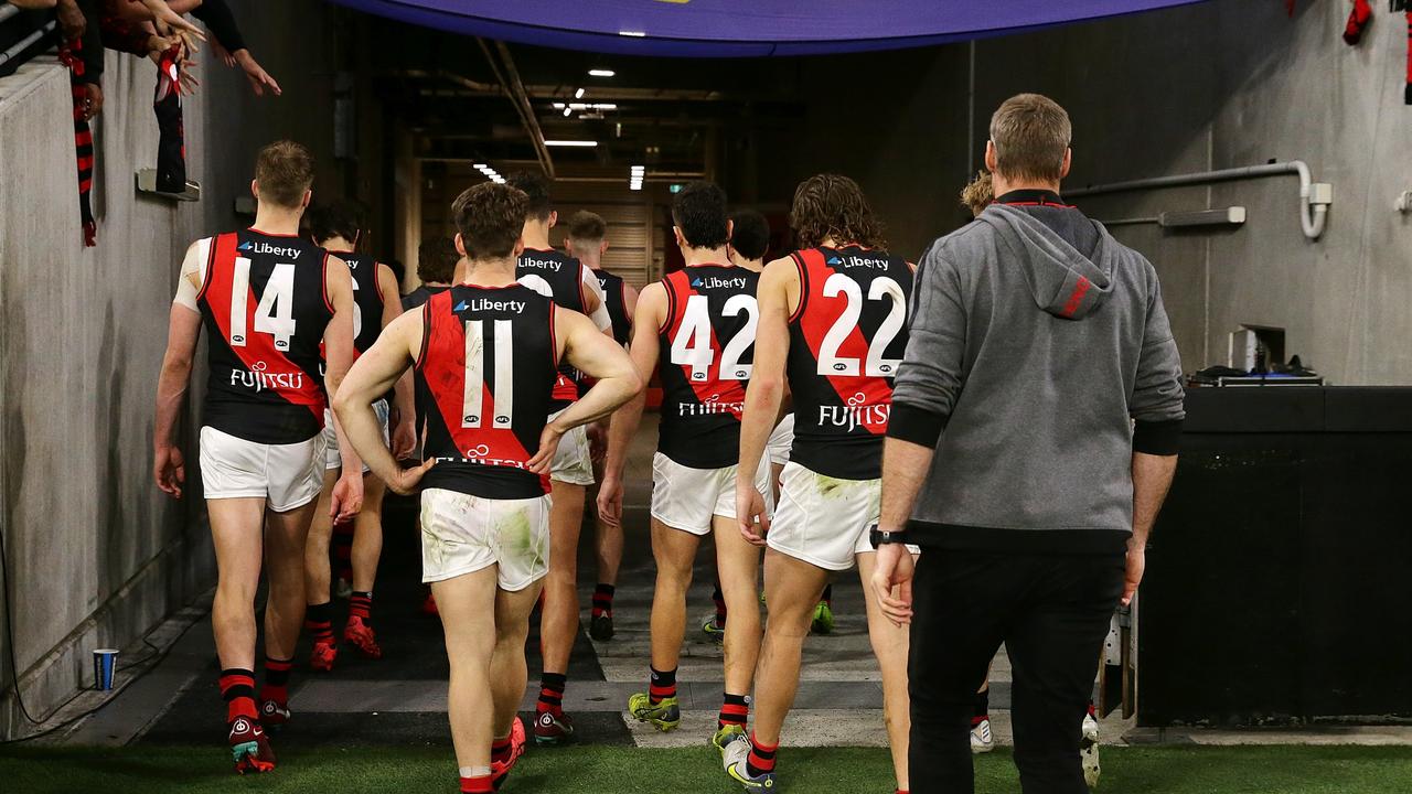 Coach Ben Rutten follows in his players after their loss on the road. Picture: Will Russell/AFL Photos via Getty Images