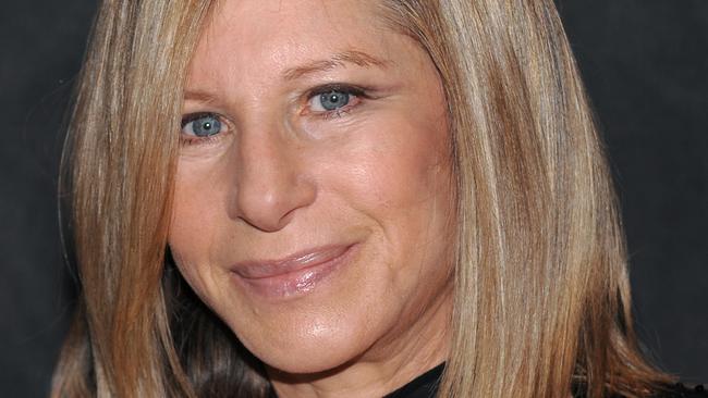 FILE - Singer Barbra Streisand poses for a photo at the Waldorf-Astoria following her performance at the Village Vanguard in this Saturday, Sept. 26, 2009 file photo taken in New York. (AP Photo/Evan Agostini, File)