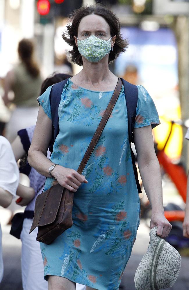 A woman wear a mask in Brisbane in January. Picture: NCA NewsWire/Tertius Pickardd