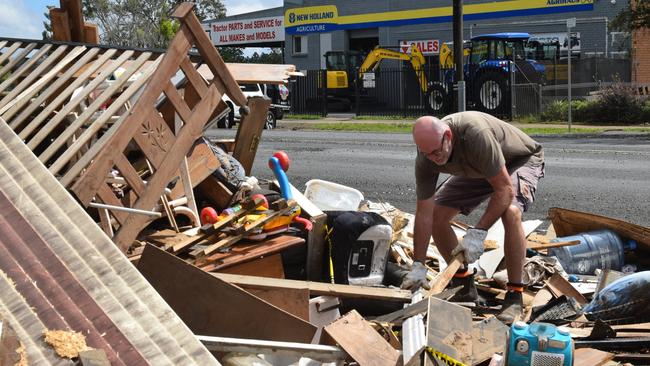 Brett O'Driscoll cleans up outside his Casino Street home which he purchased in May 2020 Picture: Nicholas Rupolo.