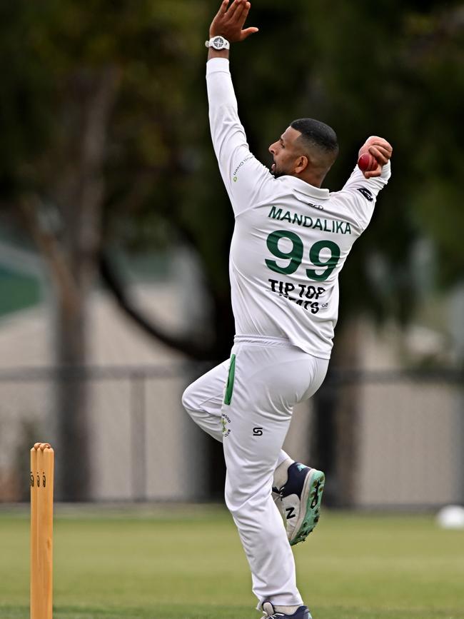 Spotswood’s Sandeep Mandalika rolls the arm over in the VSDCA grand final. Picture: Andy Brownbill