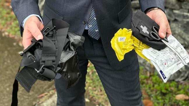 Queensland Police Union president Shane Prior with a tourniquet