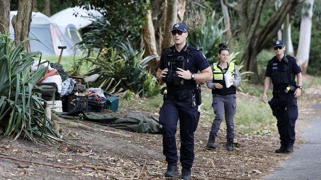 Police and other services pictured assisting the homeless vacating their campsite at the Gayndah Coastal Arboretum in Woody Point, Brisbane 17th February 2025. (Image/Josh Woning)