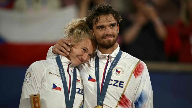 The former couple stared down defeat before rallying to win. Picture: Carl De Souza/AFP