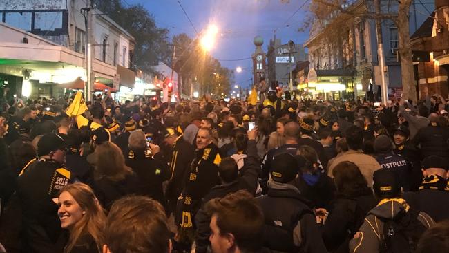 Crowds packed Swan St after the AFL 2017 Grand Final.