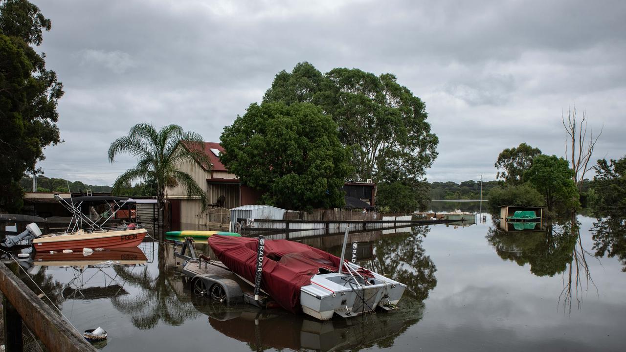 A view of a flooded backyard of a house in Windsor, Sydney. Picture: NCA NewsWire / Flavio Brancaleone