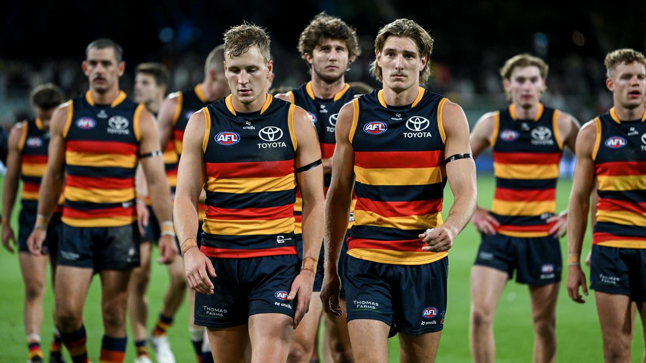 ADELAIDE, AUSTRALIA - MARCH 22: Jordan Dawson of the Crows leads his team off after losing the round two AFL match between Adelaide Crows and Geelong Cats at Adelaide Oval, on March 22, 2024, in Adelaide, Australia. (Photo by Mark Brake/Getty Images)
