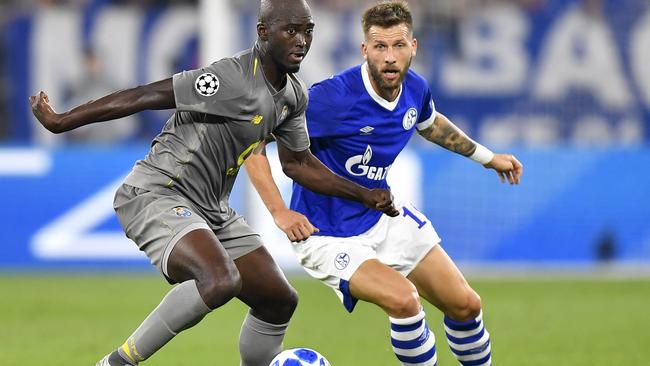 Porto midfielder Danilo and Schalke forward Guido Burgstaller challenge for the ball during the Champions League group D match. Picture: AP