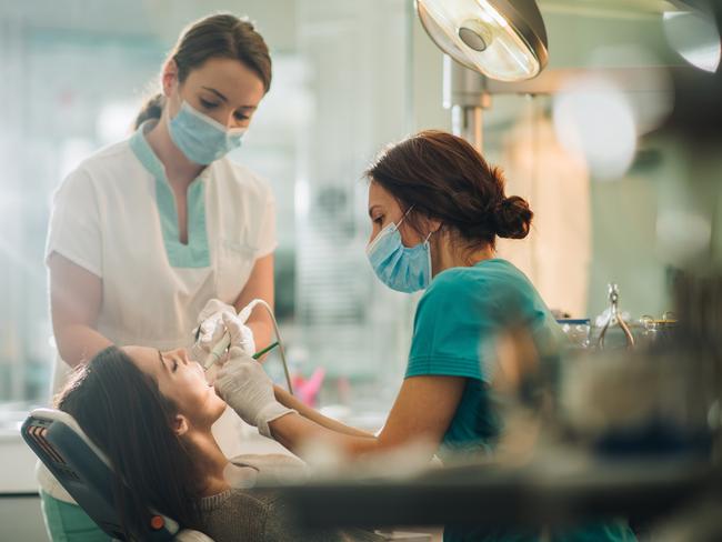 If the sight of blood and drilling doesn’t scare you, a role as a dental assistant could be perfect. Picture: iStock.