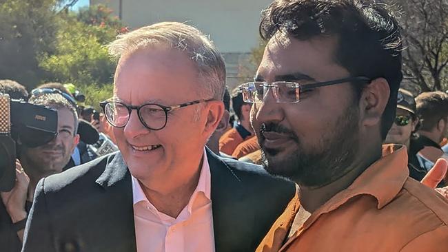 Prime Minister Anthony Albanese with workers at the Whyalla Steelworks after announcing a $2.4bn bailout package.