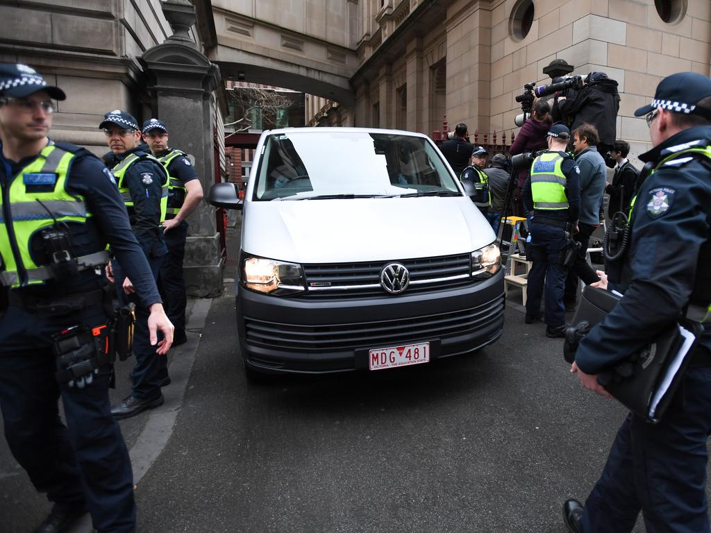 A van arrives with Cardinal George Pell at the Supreme Court. Picture: Erik Anderson/AAP