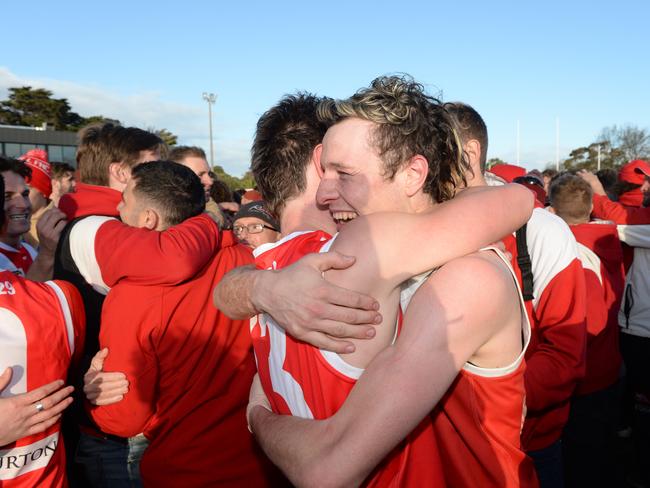 Red Hill players Tom McEncroe and Jonathon Ross after the final siren in the MPNFL Division 2 grand final in September. Picture:Chris Eastman/AAP