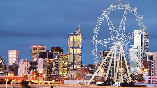 A sign at the bottom of the Melbourne Star observation wheel advertises a service that no longer works.