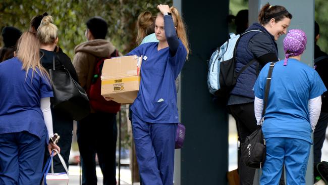 Nurses are among the public health officials supporting residents in the towers. Picture: Andrew Henshaw