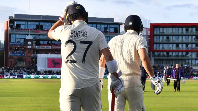 England's Joe Denly and Rory Burns head out to bat. Picture: AFP