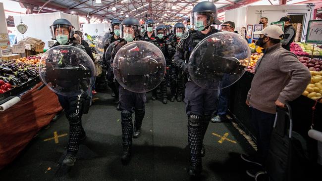 Police turn out in force at Melbourne’s Queen Victoria Market on Sunday. Picture: Getty Images