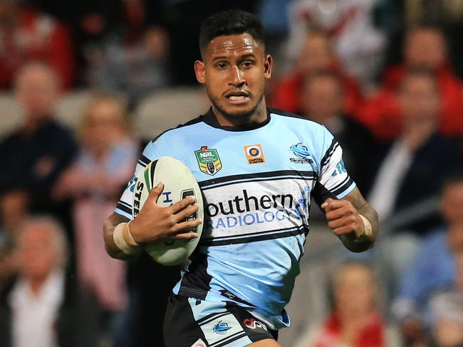 Ben Barba makes a break against the Dragons. pic Mark Evans