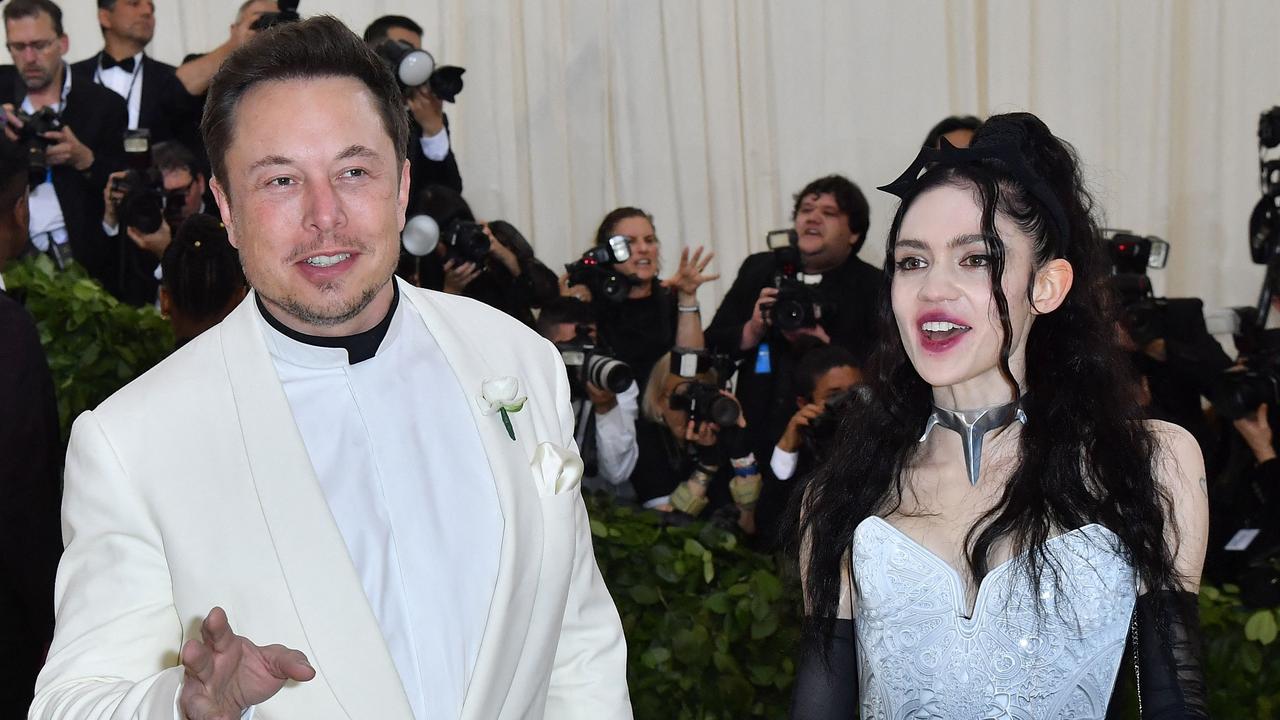 Billionaire entrepreneur Elon Musk and the musician Grimes, who revealed the eccentric entrepreneur lives below the poverty line at times. Picture: Angela Weiss/AFP