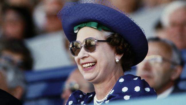 Britain's Queen Elizabeth II attends a show given by children during a floral procession and floral dance at Adelaide Showground in March, 1986. Picture: AFP