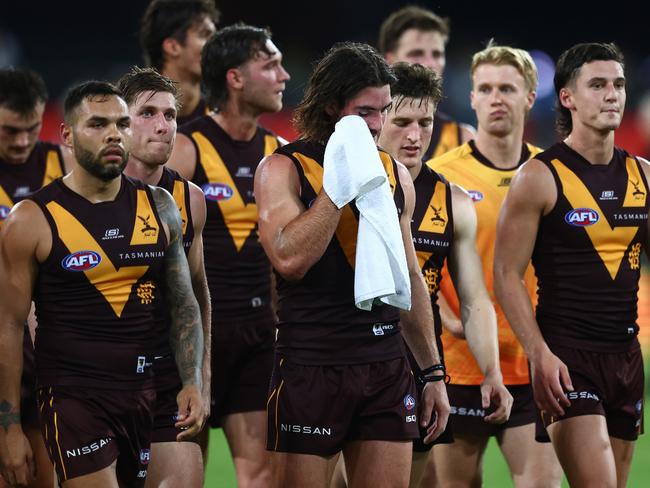 The Hawks leave the field after the loss to the Suns. Picture: Chris Hyde/Getty Images