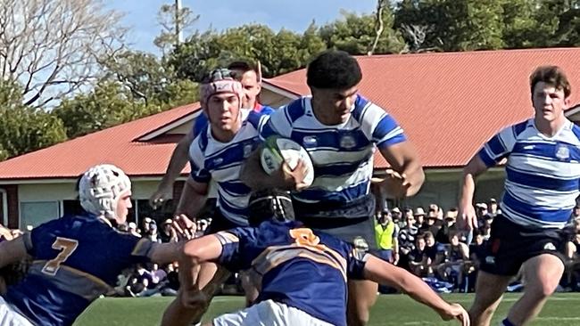 Nudgee ace Rob Toia (Roosters) on the way to scoring against Churchie, with Liam Le Blanc (South Sydney) on his right.