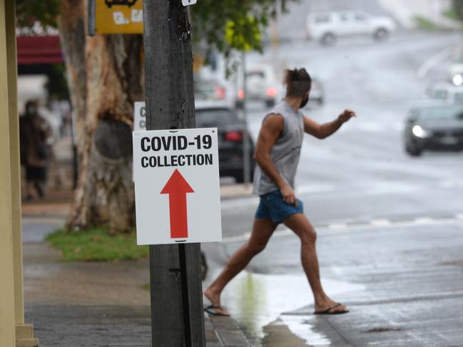 Avalon locals brave wet conditions during the COVID-19 lockdown on Sydney’s northern beaches on Wednesday. Photo Jeremy Piper