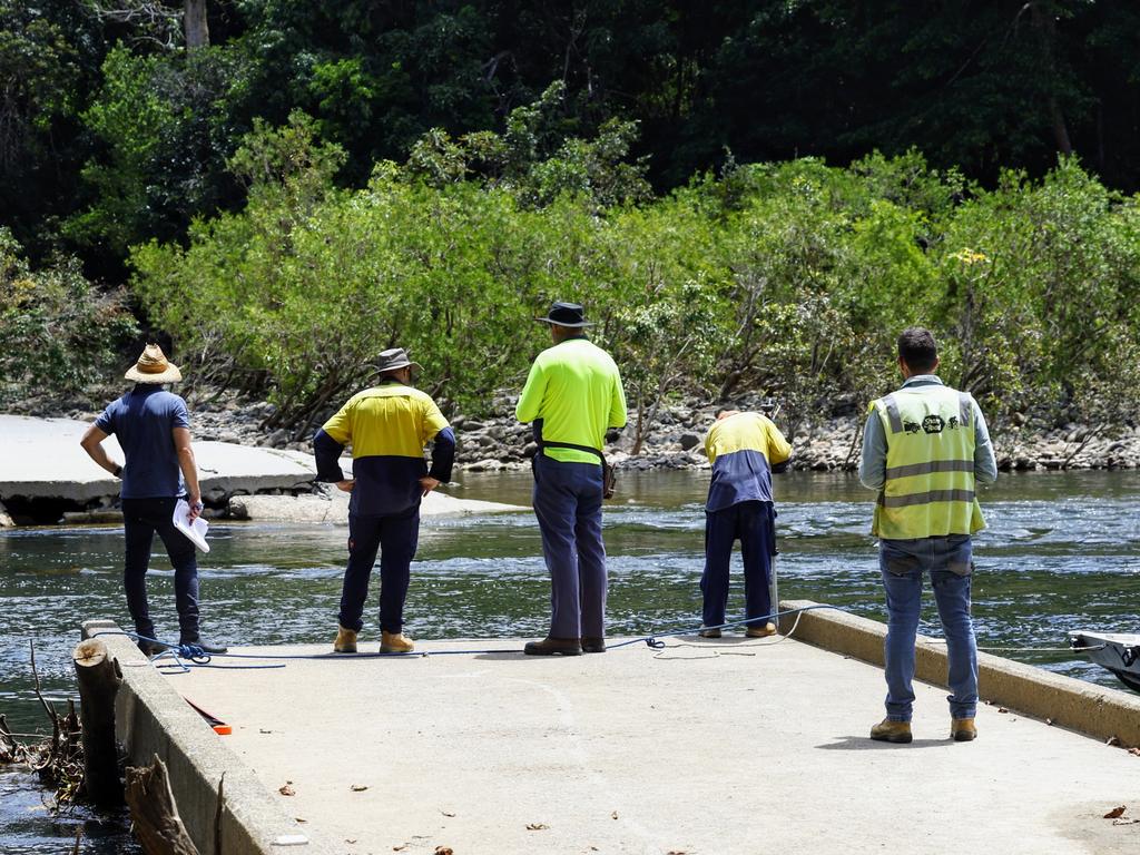 Engineers from Cairns Regional Council and Dawson's Engineering complete surveying work to install a pedestrian bridge after 25m of the permanent concrete Fisheries Bridge causeway over the Mulgrave River was washed away by severe flooding caused by Tropical Cyclone Jasper. Picture: Brendan Radke