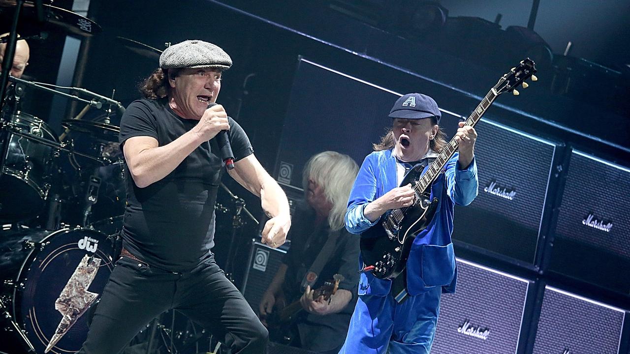 HOUSTON, TX – FEBRUARY 26: Brian Johnson (L) and Angus Young perform in concert with AC/DC at the Toyota Center on February 26, 2016 in Houston, Texas. (Photo by Gary Miller/Getty Images)