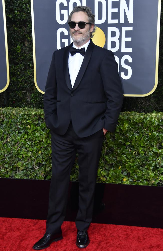 Golden Globes winner Joaquin Phoenix wears same tuxedo to every award ...