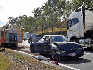 HIGHWAY CRASH: Two people were taken to hospital after a crash near the Kilkivan/Wide Bay Highway turnoff. Picture: Josh Preston