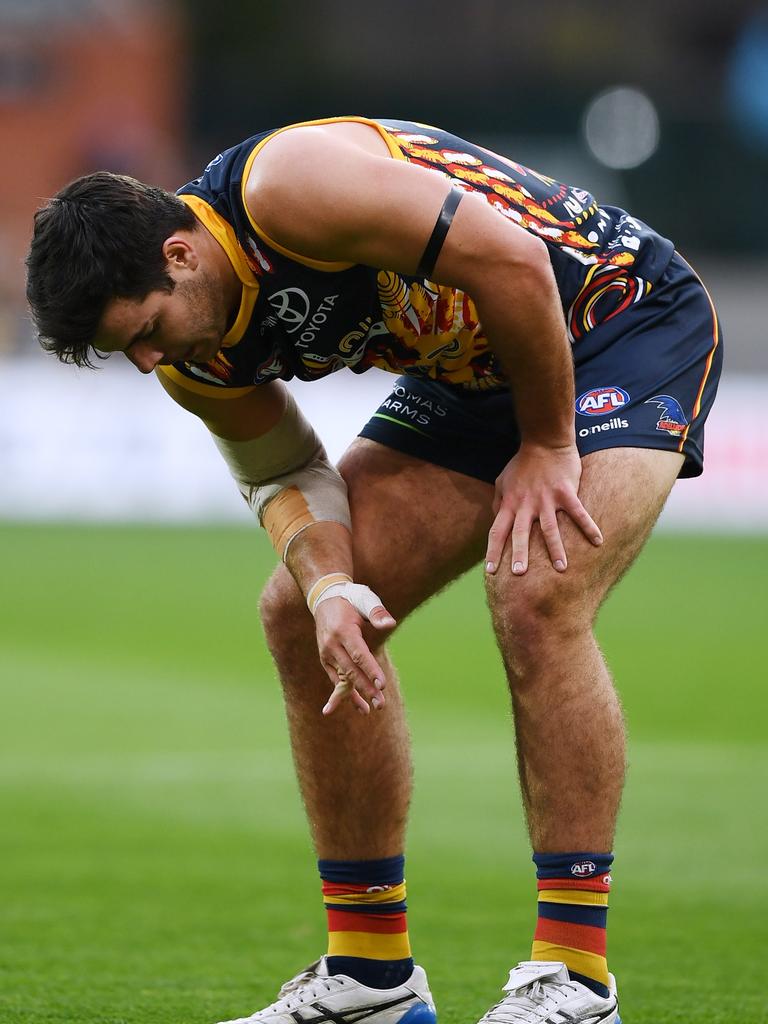 Darcy Fogarty left the ground with a gruesome finger injury. Picture: Getty Images