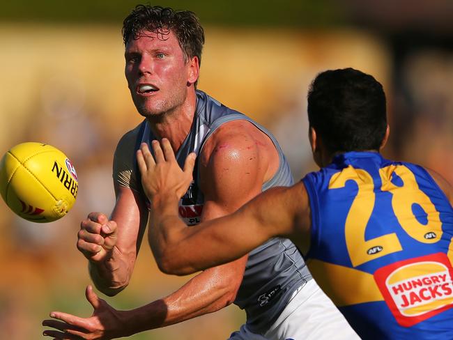 PERTH, AUSTRALIA - FEBRUARY 25: Brad Ebert of the Power handballs during the JLT Community Series AFL match between the West Coast Eagles and the Port Adelaide Power at Leederville Oval on February 25, 2018 in Perth, Australia.  (Photo by Paul Kane/Getty Images)