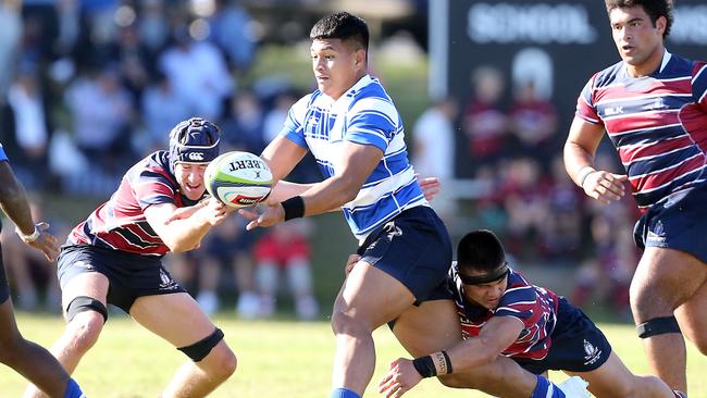 Titi Nofoagatotoa offloads against The Southport School. Picture: Richard Gosling