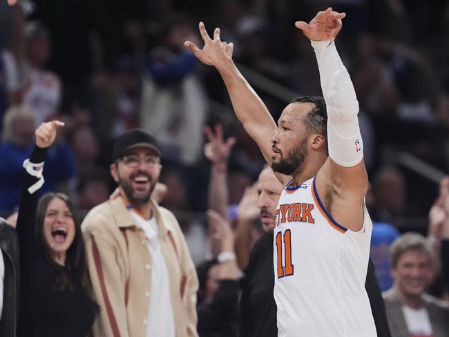 New York Knicks' Jalen Brunson (11) gestures to fans during the second half of Game 6 in the Eastern Conference semifinals of the NBA basketball playoffs against the Boston Celtics Friday, May 16, 2025, in New York. (AP Photo/Frank Franklin II)