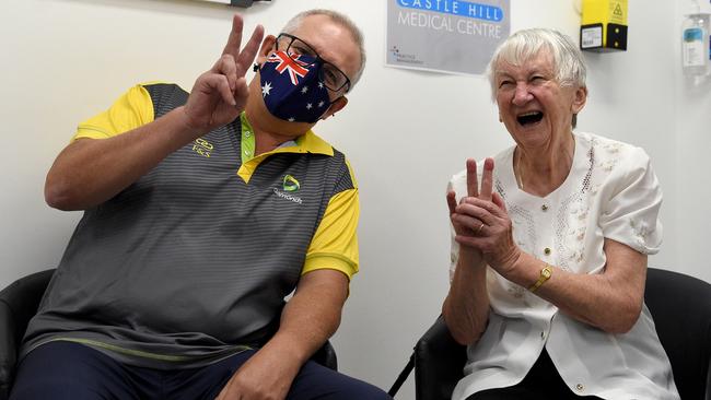 Scott Morrison and aged-care resident Jane Malysiak after receiving their second and final COVID-19 vaccination shot at the Castle Hill Medical Centre in Sydney on Sunday. Picture: Bianca De Marchi