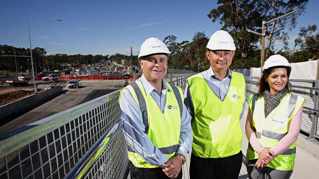 RMS executive director Sydney John Hardwick, RMS project director Boon Tan and project community engagement Elisabeth Sacco on the RMS construction work site on Warringah Rd, Frenchs Forest. Picture: Adam Yip / Manly Daily