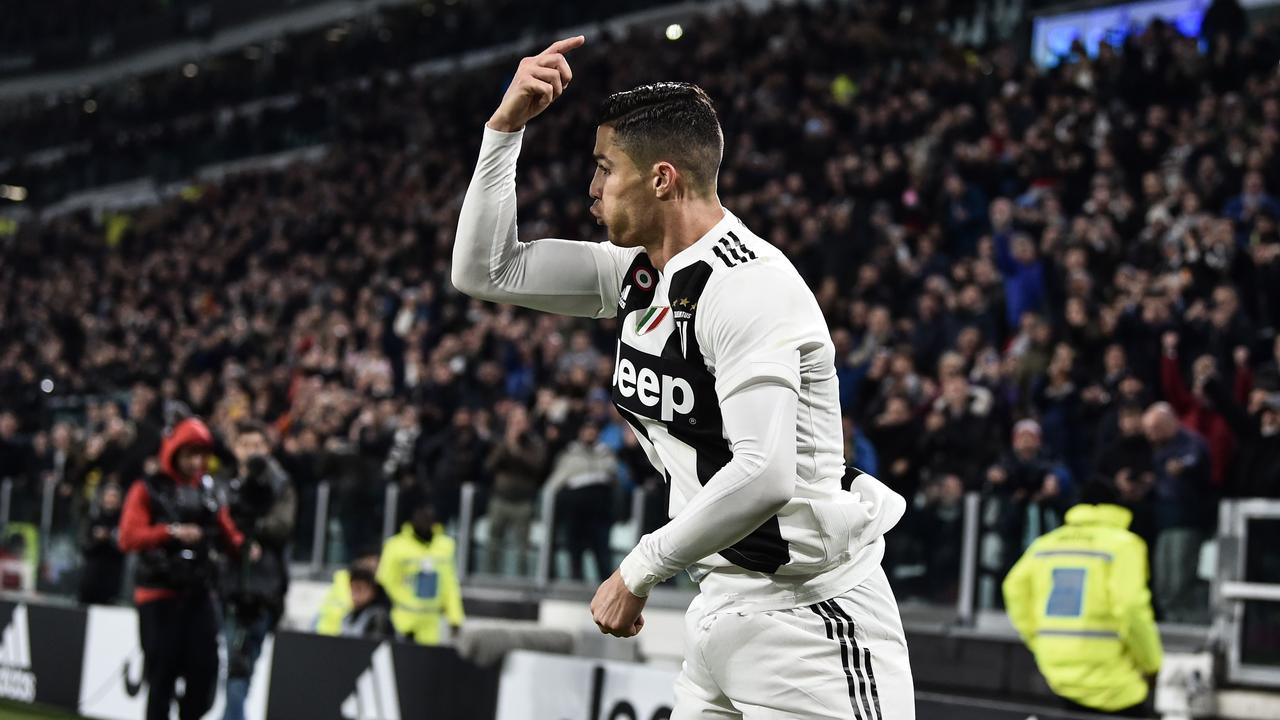 Juventus' Portuguese forward Cristiano Ronaldo celebrates after opening the scoring against SPAL
