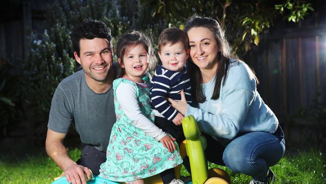 Roydan Baillie and Morgan Madden with children Lily, 3, and Oscar, 1, at their home. Picture Rebecca Michael