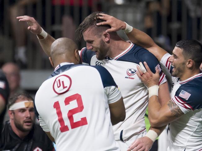 United States' Cam Dolan celebrates his try against Canada during the first half of a rugby match in Vancouver, British Columbia, Saturday, Sept. 7, 2019. (Jonathan Hayward/The Canadian Press via AP)