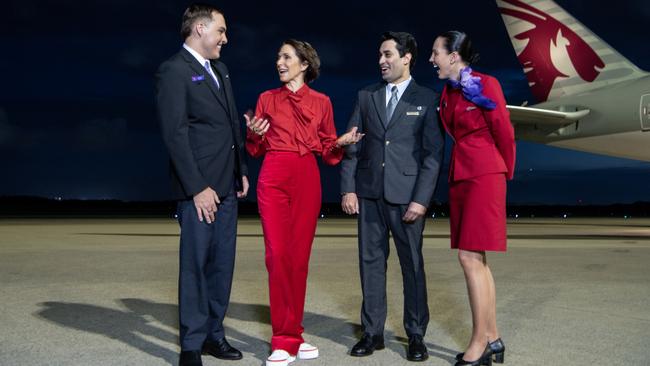 Virgin Australia CEO Jayne Hrdlicka with crew of Qatar and Virgin at Brisbane Airport to mark the deeper partnership. Picture: James D. Morgan/Getty Images