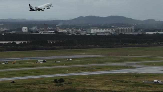 A view of an Air New Zealand flight taking off from the air traffic control tower at Brisbane Airport. Picture: Tara Croser