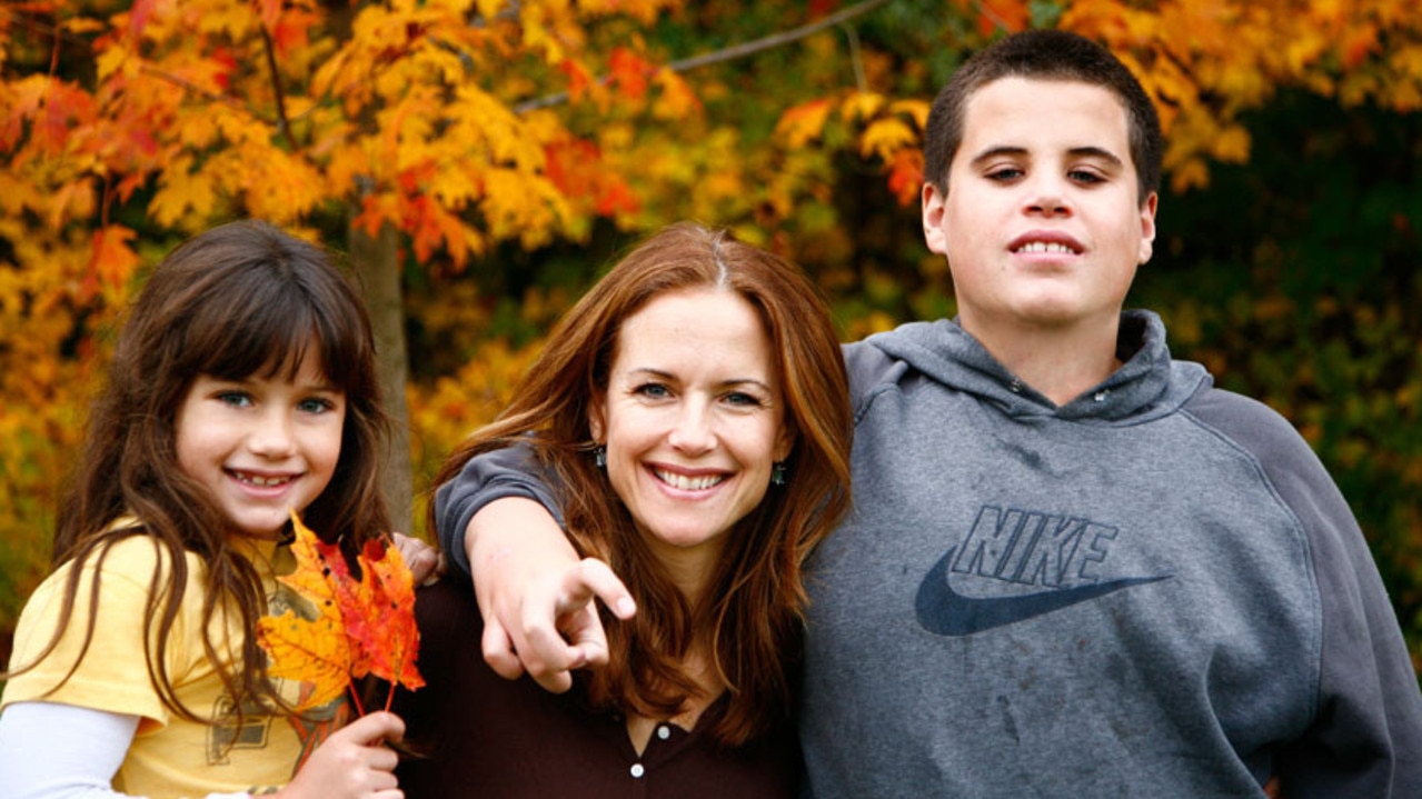 Preston with her late son Jett Travolta and daughter Ella. Jett, 16, was found unconscious during a family holiday in 2009. Picture: AFP.