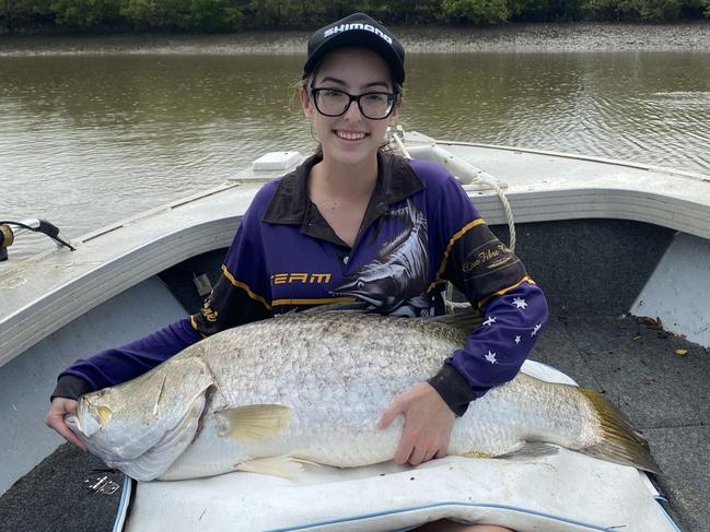 Taiya Kilcullen with her monster 1.06m barramundi caught in the Haughton River.