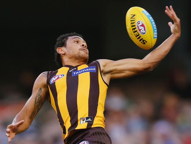 MELBOURNE, AUSTRALIA - APRIL 23:  Cyril Rioli of the Hawks compete for the ball over Tom Barrass of the Eagles (L) and Shannon Hurn of the Eagles during the round five AFL match between the Hawthorn Hawks and the West Coast Eagles at Melbourne Cricket Ground on April 23, 2017 in Melbourne, Australia.  (Photo by Michael Dodge/Getty Images)