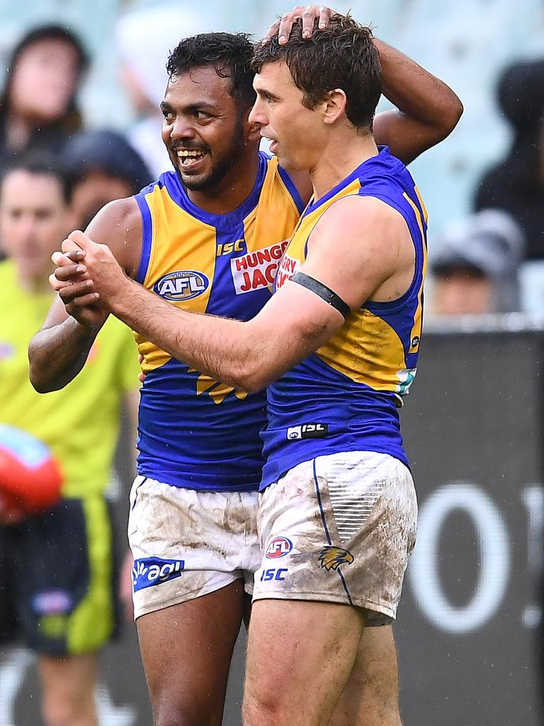 Rioli and Eagles teammate Jamie Cripps celebrate a goal during at the MCG in 2019. Picture: Quinn Rooney/Getty Images