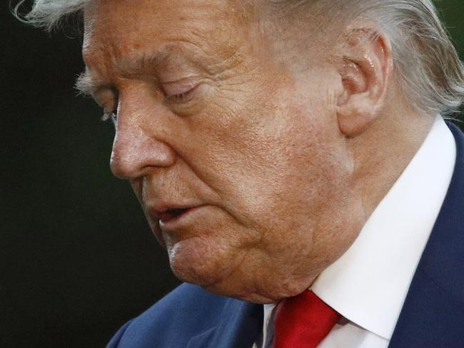 President Donald Trump walks across the South Lawn of the White House in Washington, Saturday, May 30, 2020, after stepping off Marine One as he returns from Kennedy Space Center for the SpaceX Falcon 9 launch. (AP Photo/Patrick Semansky)