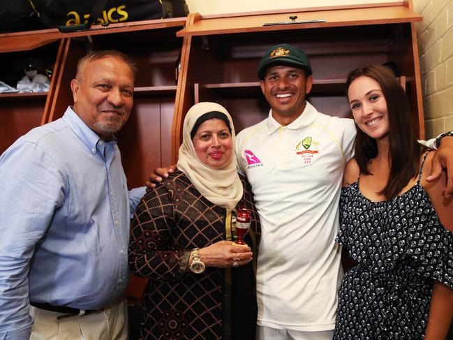 AUsman Khawaja with his family, including father Tariq who taught him the value of a poker face. Picture: Phil Hillyard