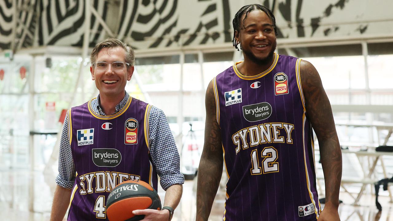 Dominic Perrottet alongside Sydney Kings big man Jarell Martin. Mr. Perrottet is currently the Kings’ number one ticket holder. Picture: David Swift
